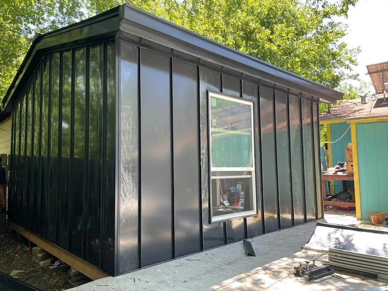 Black standing seam metal wall panels for Metal Roof Installation in Huntington Beach