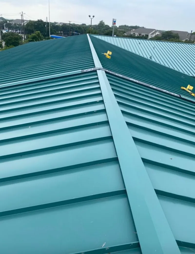Green commercial metal roof ridge and valley for Metal Roof Repair in Huntington Beach